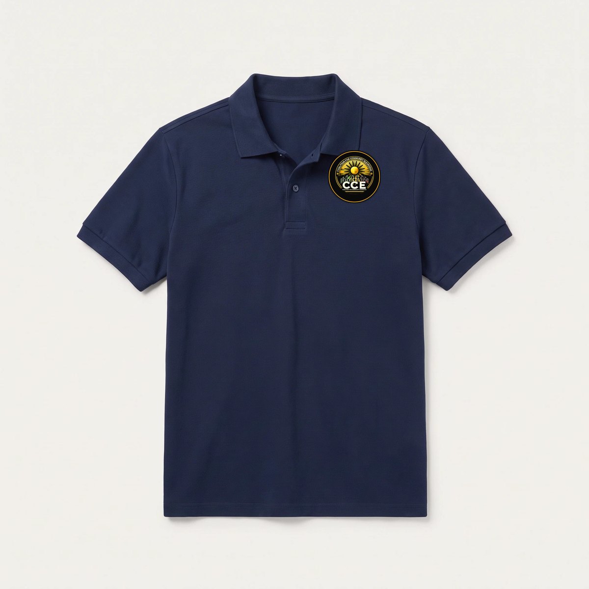 Navy collared polo shirt with the CCE badge on the chest.